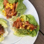 A rotisserie chicken, BBQ sauce, and a few vegetable staples make these Tex-Mex Chicken Lettuce Wraps one simple and fast low-carb meal.