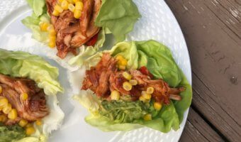 A rotisserie chicken, BBQ sauce, and a few vegetable staples make these Tex-Mex Chicken Lettuce Wraps one simple and fast low-carb meal.