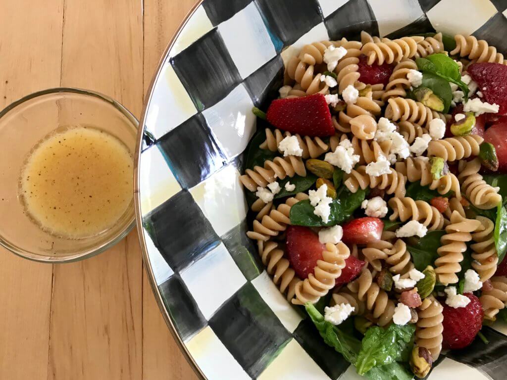 Strawberry Spinach Pasta Salad with Orange Dressing is a light, refreshing pasta salad made with fresh spinach, strawberries, whole wheat pasta, and 100% orange juice.