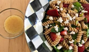 Strawberry Spinach Pasta Salad with Orange Dressing is a light, refreshing pasta salad made with fresh spinach, strawberries, whole wheat pasta, and 100% orange juice.