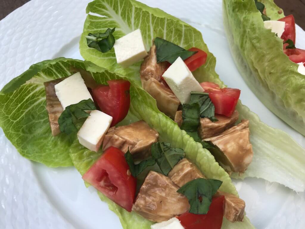 IMG_2060 - Mom to Mom Nutrition Caprese Chicken Lettuce Wraps have all the components of the classic Caprese salad with extra protein from lean chicken breast and crunch from romaine lettuce leaves. A simple and fresh meal for lunch or dinner.