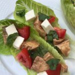 Caprese Chicken Lettuce Wraps have all the components of the classic Caprese salad with extra protein from lean chicken breast and crunch from romaine lettuce leaves. A simple and fresh meal for lunch or dinner.
