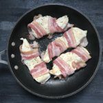 These Bacon Ranch Chicken Breasts are wrapped in bacon, seasoned with a dry ranch seasoning, and smothered with shredded cheddar cheese for a simple weeknight dinner!