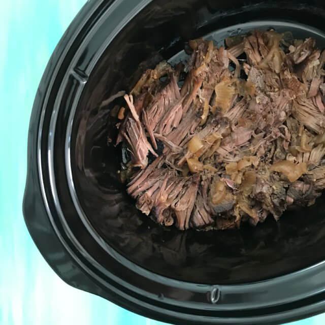 Slow Cooker Shredded Beef is the ideal cook once dine twice meal. This basic recipe can be eaten as-is, or used for multiple recipe ideas.