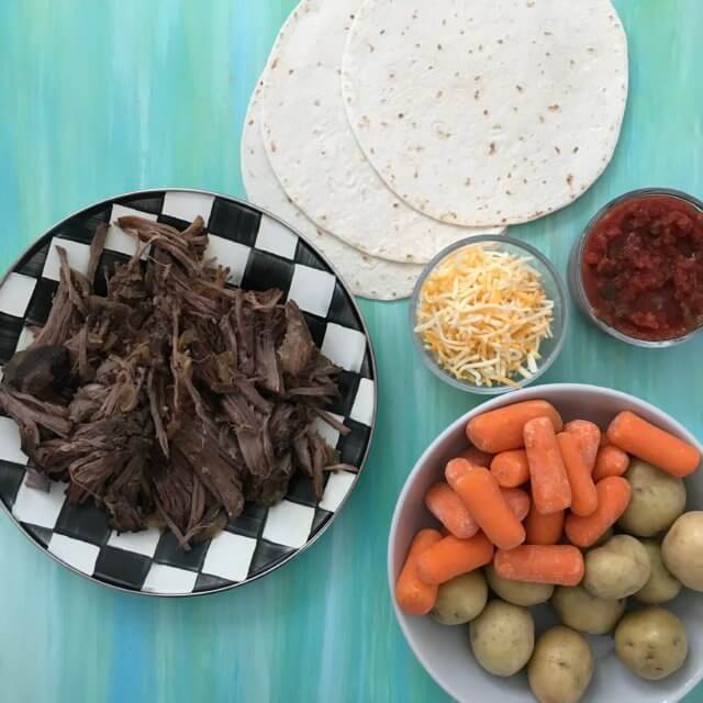 Slow Cooker Shredded Beef is the ideal cook once dine twice meal. This basic recipe can be eaten as-is, or used for multiple recipe ideas.