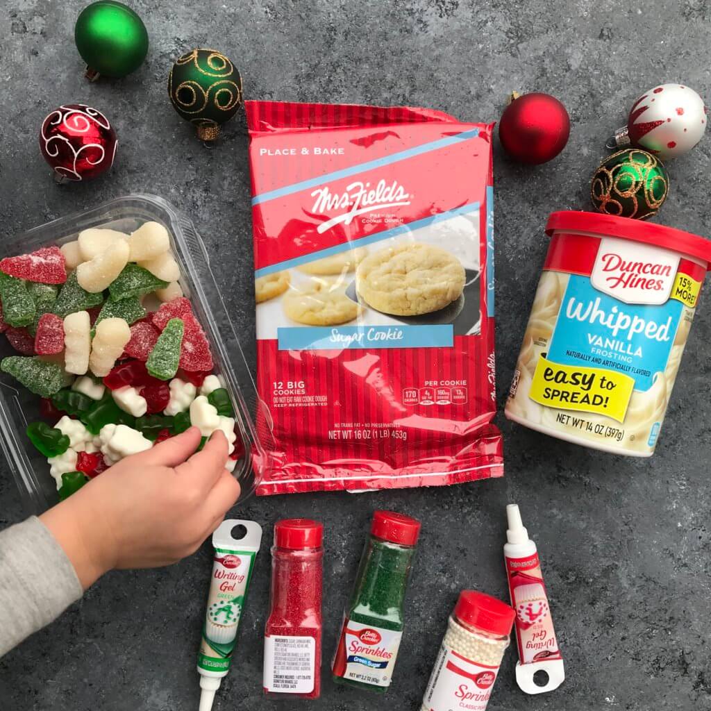 A Christmas Cookie Decorating Station is a simple, fun holiday-inspired activity for kids of all ages. Assemble the station based on your family's preferences for cookies, frosting, and toppings!&nbsp;