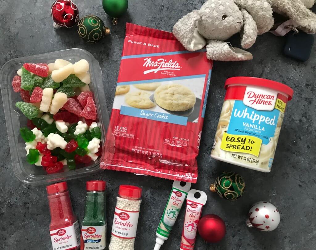 A Christmas Cookie Decorating Station is a simple, fun holiday-inspired activity for kids of all ages. Assemble the station based on your family's preferences for cookies, frosting, and toppings!&nbsp;