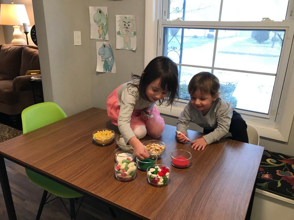 A Christmas Cookie Decorating Station is a simple, fun holiday-inspired activity for kids of all ages. Assemble the station based on your family's preferences for cookies, frosting, and toppings!&nbsp;