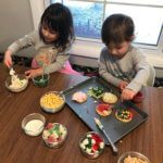 A Christmas Cookie Decorating Station is a simple, fun holiday-inspired activity for kids of all ages. Assemble the station based on your family's preferences for cookies, frosting, and toppings! 