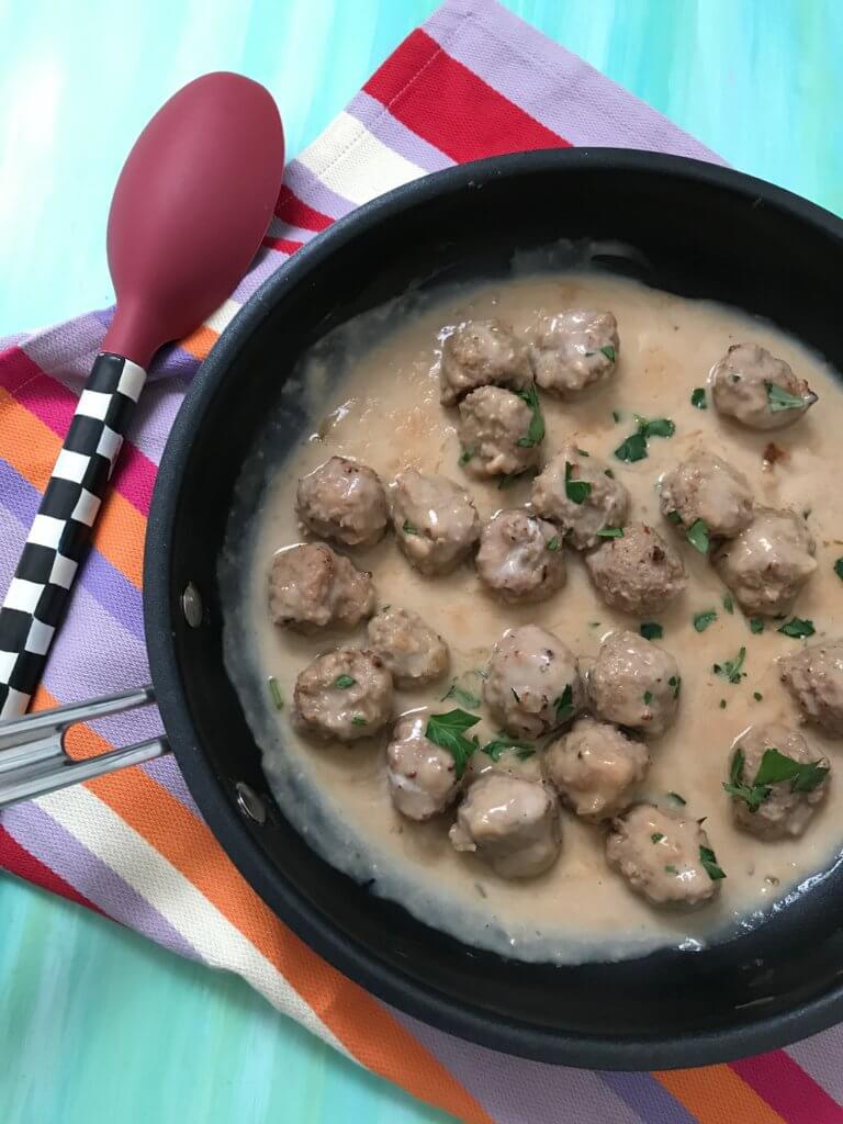 Skillet Swedish Meatballs are a one pot comfort meal, perfect for the littlest fingers or biggest forks in your family. Made with the ease of a simple skillet sauce and frozen beef meatballs.