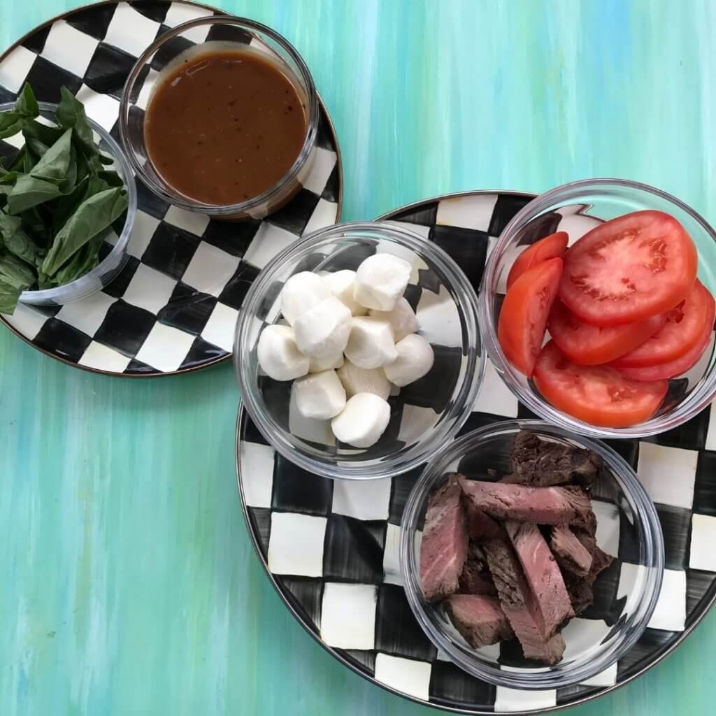 Caprese-steak-salad-2 - Mom to Mom Nutrition Inspired by the traditional Caprese Salad, this Caprese Steak Salad is topped with grilled steak and drizzled with a simple balsamic dressing.