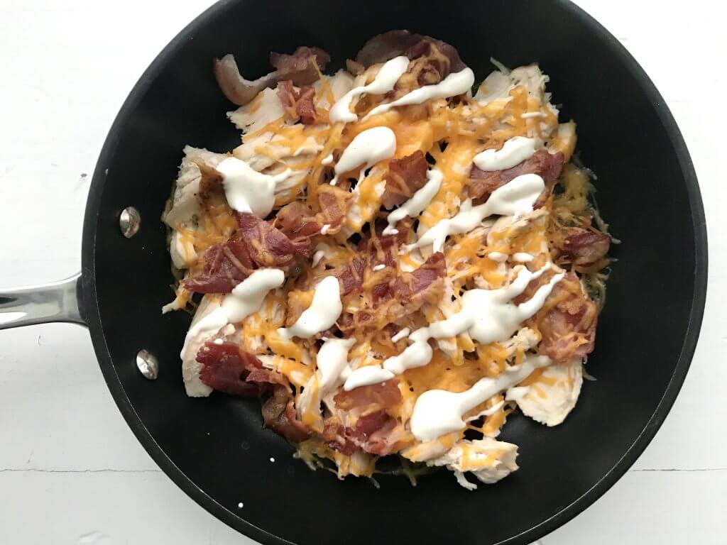 This family favorite Chicken Bacon Ranch Skillet is made with just four ingredients and is ready in under 15 minutes. A winner chicken dinner!