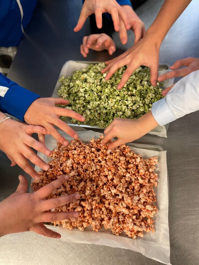 IMG_8967 - Mom to Mom Nutrition Red and green Christmas Caramel Corn is festive, sweet, and super easy to make with the help of your microwave. No corn syrup needed with a maple syrup swap.