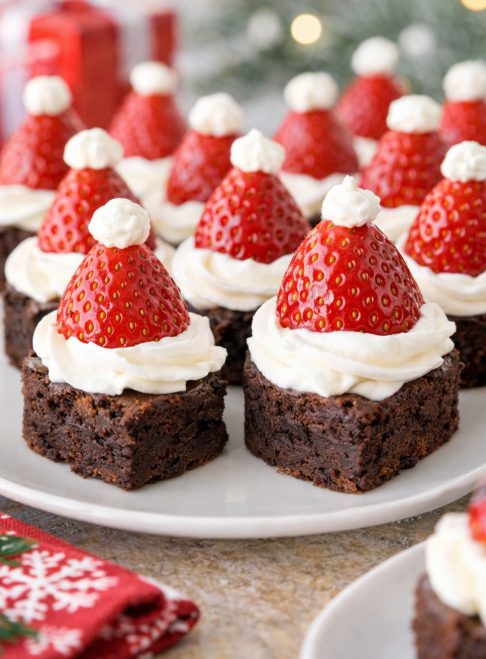 santa-hat-brownie-bites.jpg - Mom to Mom Nutrition Santa hat brownie bites made with chocolate brownies, whipped cream, and strawberries