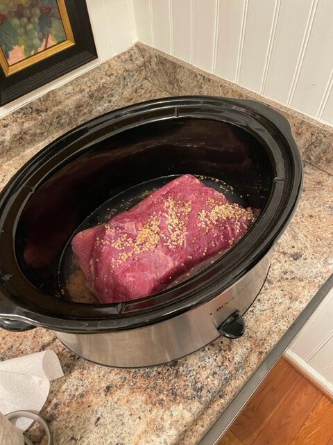 Intimidated at the thought of cooking corned beef at home? The easiest way to cook corned beef is so much simpler than you think! All you need is a slow cooker or a roasting pan and you'll wow a crowd with this tender corned beef recipe.&nbsp;