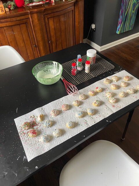 IMG_5982 - Mom to Mom Nutrition Italian Christmas cookies are soft, poofy sugar cookies topped with a sweet almond glaze and colorful sprinkles.