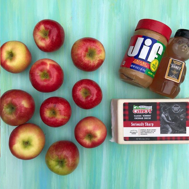 Discover 5 simple, healthy apple dips made with Greek yogurt, nut butter, caramel, pumpkin, and chocolate hummus. Perfect fall snack ideas for families!