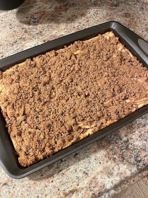 IMG_1600 - Mom to Mom Nutrition A cozy sheet pan apple pie made with premade pie crusts, cinnamon-spiced apples, and a brown sugar crumble. Perfect for holidays, potlucks, and feeding a crowd—without the fuss.