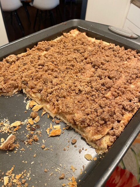 IMG_1603 (1) - Mom to Mom Nutrition A cozy sheet pan apple pie made with premade pie crusts, cinnamon-spiced apples, and a brown sugar crumble. Perfect for holidays, potlucks, and feeding a crowd—without the fuss.